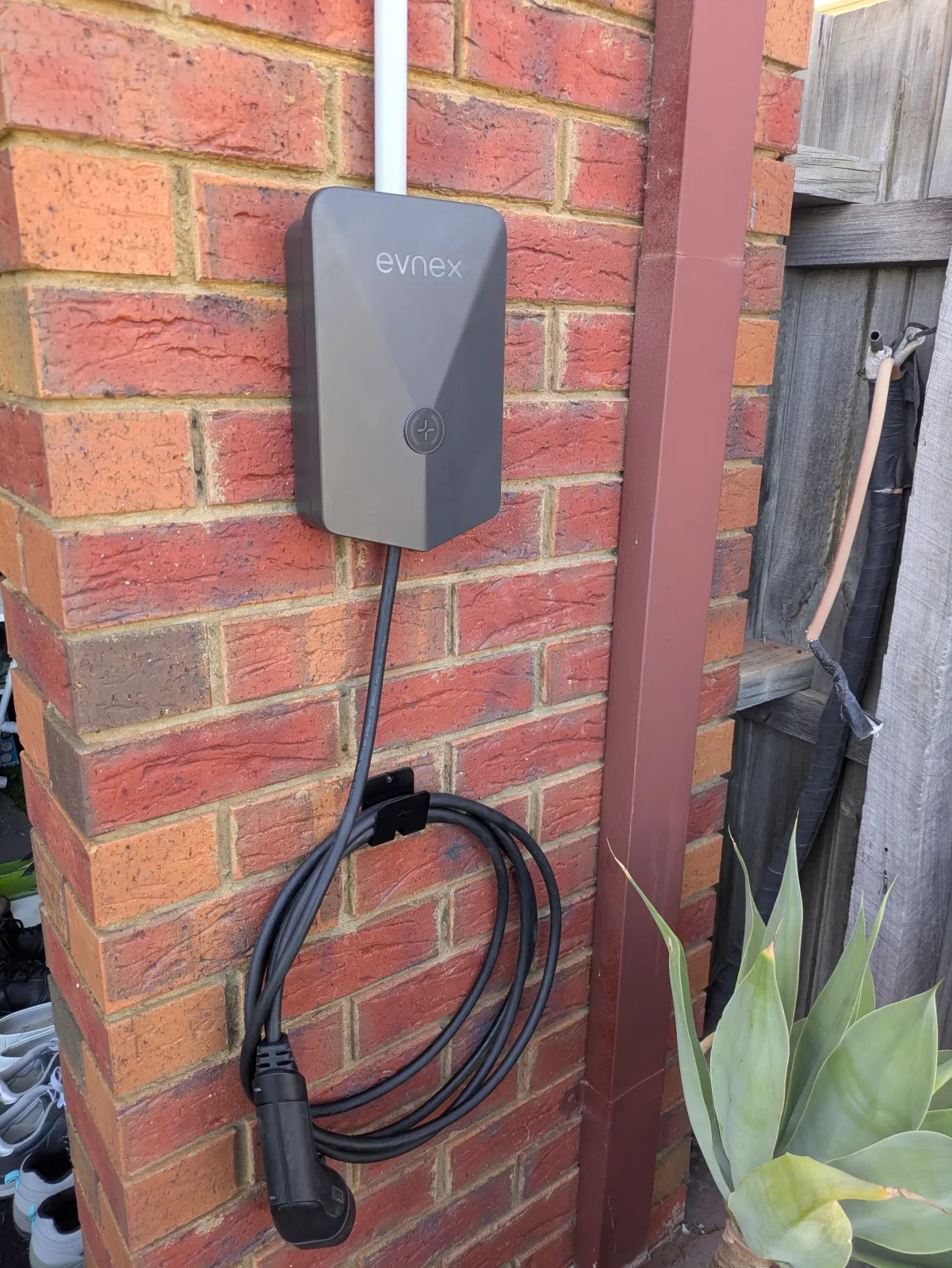 Evnex beside a side gate