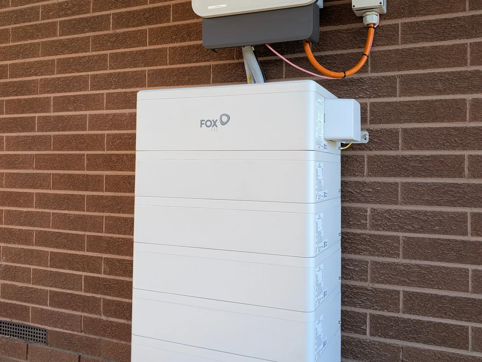 An existing Fox ESS stack beside the meter