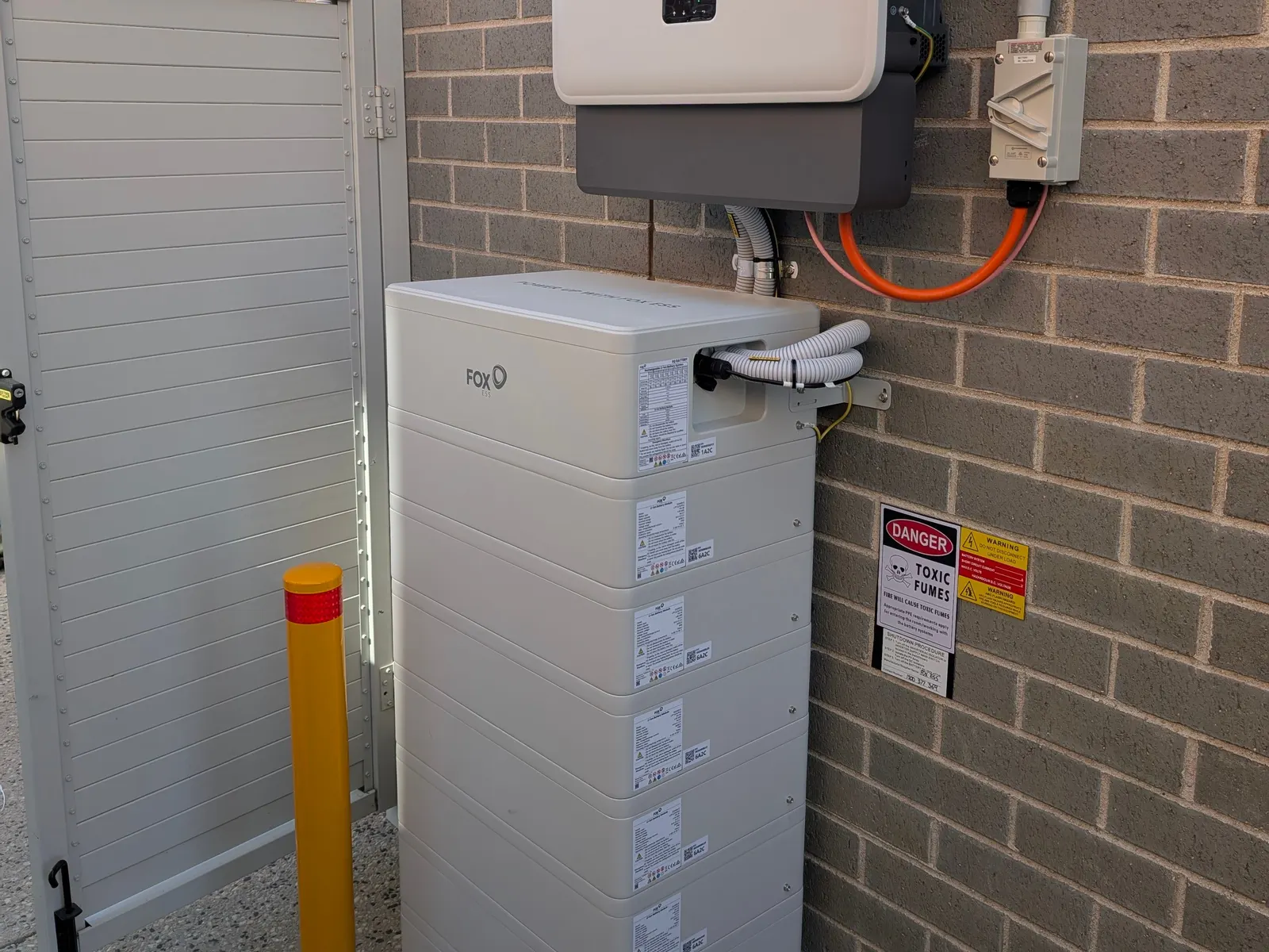 A Fox ESS CQ7 stack of six modules, installed and labelled