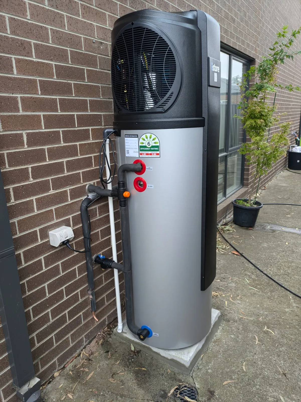 A heat pump and cylinder installed and commissioned